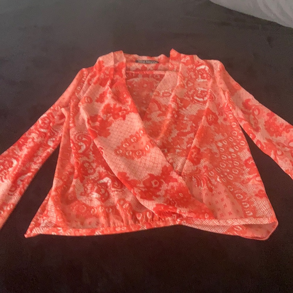 Red and white sheer cross over blouse.